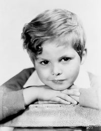 A Portrait of Dickie Moore photo print showcasing charisma and charm.