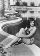 Gene Tierney Sitting at The Edge of Pool Photo Print