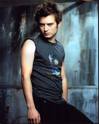 Elijah Wood wearing a Donald Duck shirt photo print