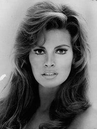 Raquel Welch iconic photo print, available in 8x10 and 16x20 sizes.