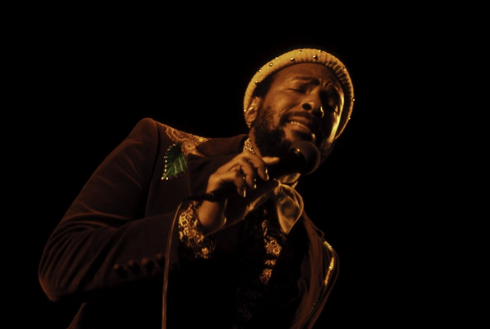 Marvin Gaye performing on stage photo print showcasing live music energy.