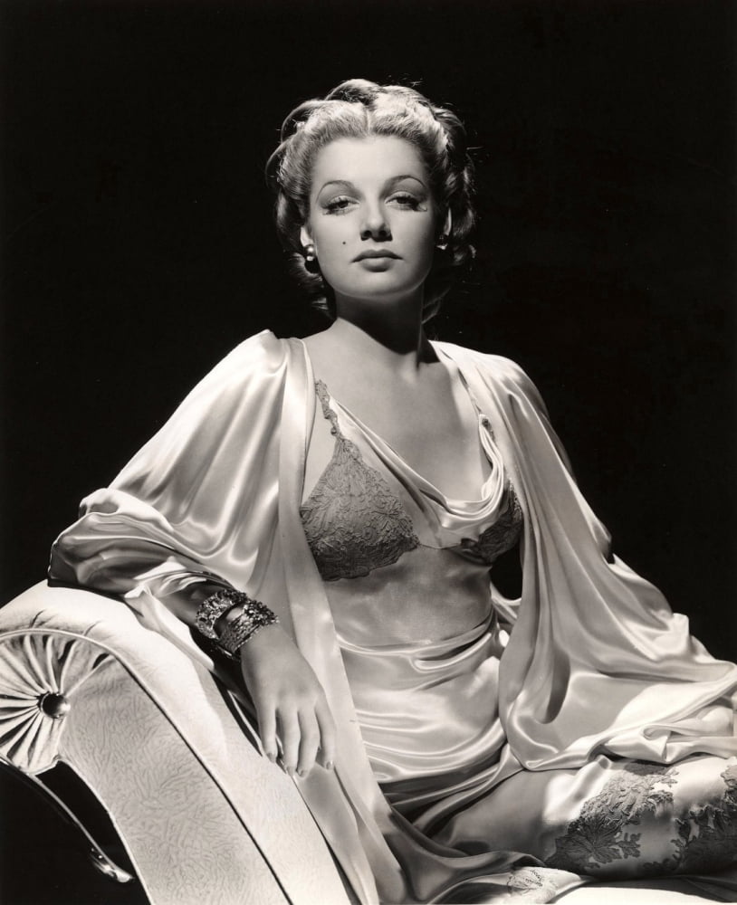 Ann Sheridan Poised Photo Print showcasing classic Hollywood elegance.