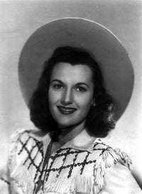 Peggy Stewart as a cowgirl photo print, showcasing classic Western charm.