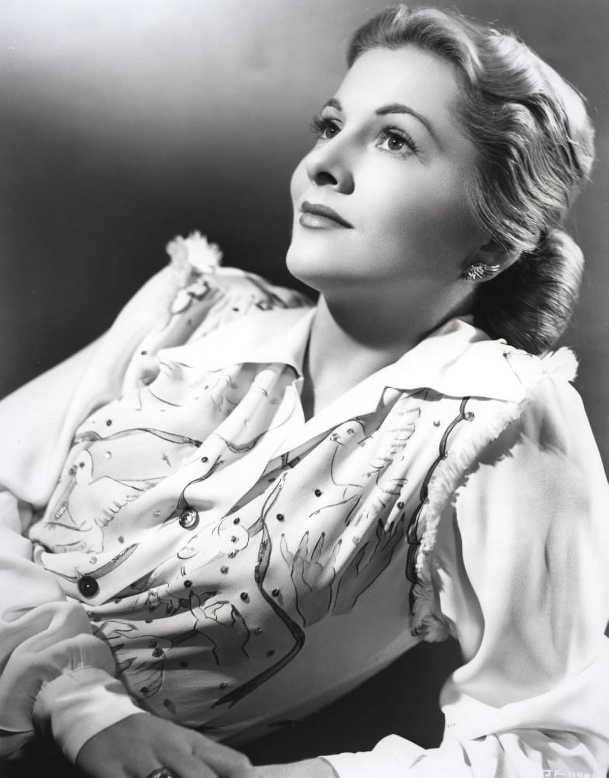 Joan Fontaine looking up in a detailed dress portrait photo print.