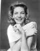 Lauren Bacall smiling photo print in vintage style.