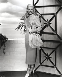 Classic photo print of Doris Day, iconic Hollywood star, available in multiple sizes.