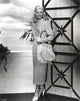 Classic photo print of Doris Day, iconic Hollywood star, available in multiple sizes.
