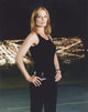 Marg Helgenberger Leaning in Wall with Red Dress Photo Print