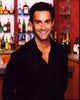 Jay Harrington photo print featuring him in an unbuttoned black shirt