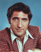 Close-up portrait photo print of Judd Hirsch in a red checkered suit