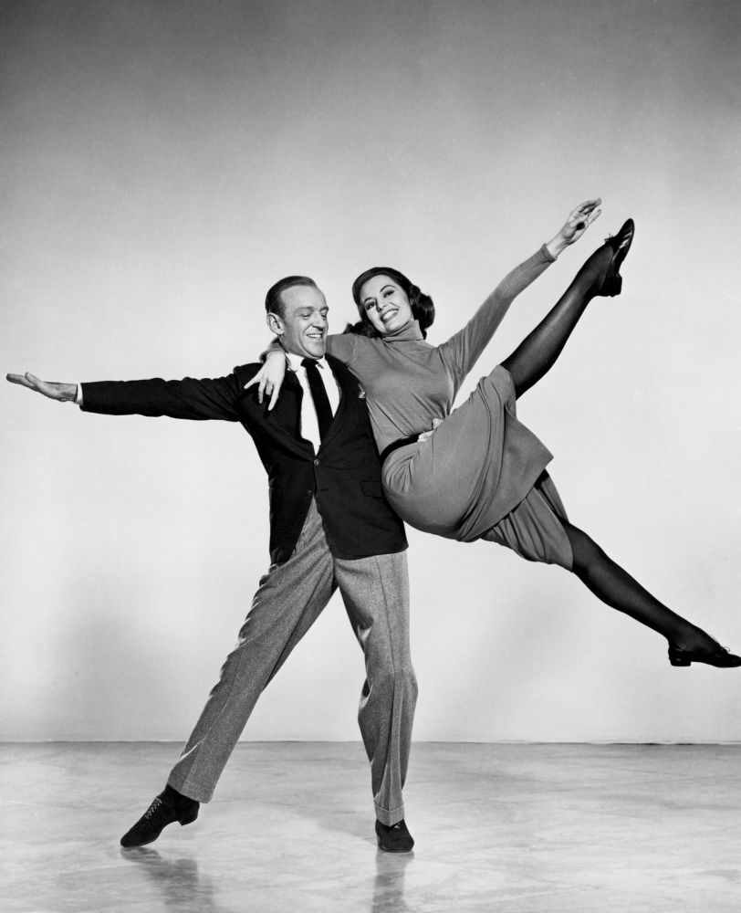 Silk Stockings movie poster print featuring Fred Astaire and Cyd Charisse.