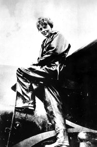 Amelia Earhart in an airplane photo print showcasing aviation history.