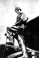 Amelia Earhart in an airplane photo print showcasing aviation history.