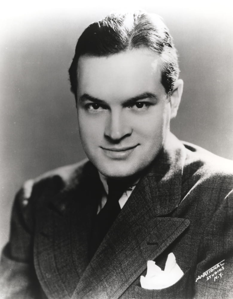 Black and white photo print of Bob Hope smiling in a formal coat.