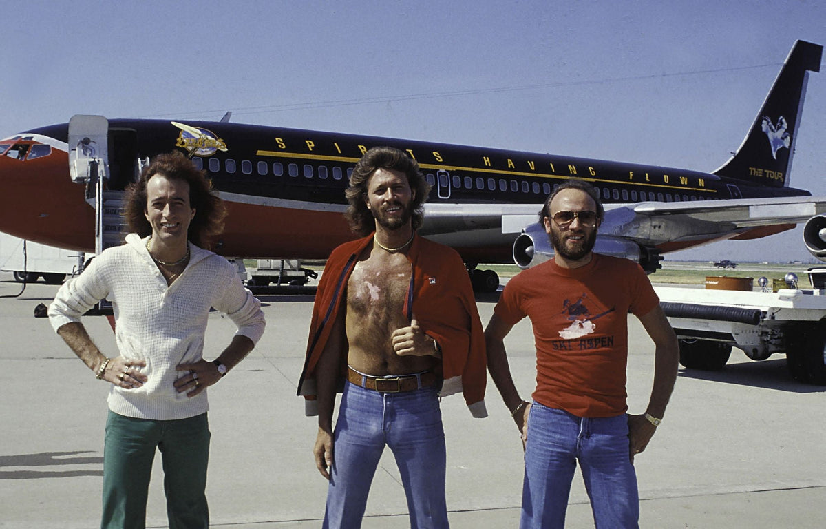 Bee Gees photo print in front of an airplane, vintage music art