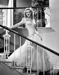 Carole Landis smiling posed photo print in gown, available in multiple sizes.