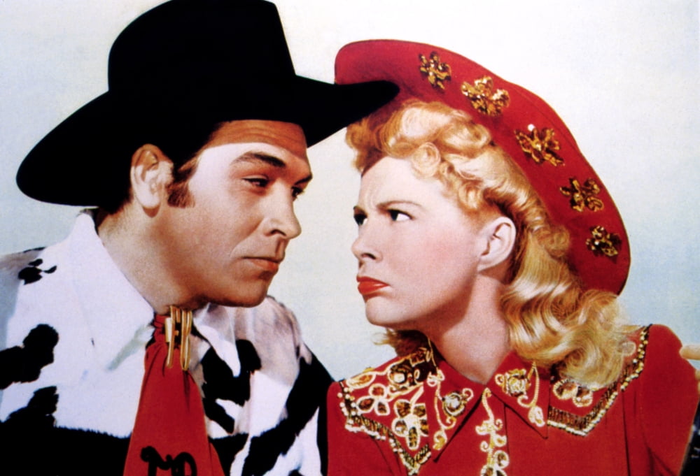 Annie Get Your Gun movie poster print featuring Betty Hutton and Howard Keel