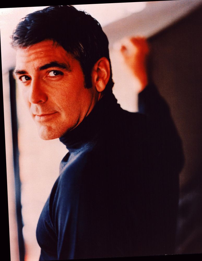 George Clooney over shoulder photo print in black turtleneck, available in multiple sizes.