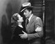 Kiss of Death movie photo print featuring Coleen Gray and Victor Mature, available in multiple sizes.