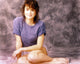 Polly Draper smiling portrait photo print wearing a blue shirt.