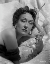 Gloria Swanson posed holding a glass of wine photo print
