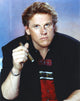 Gary Busey portrait photo print in black polo with cigar