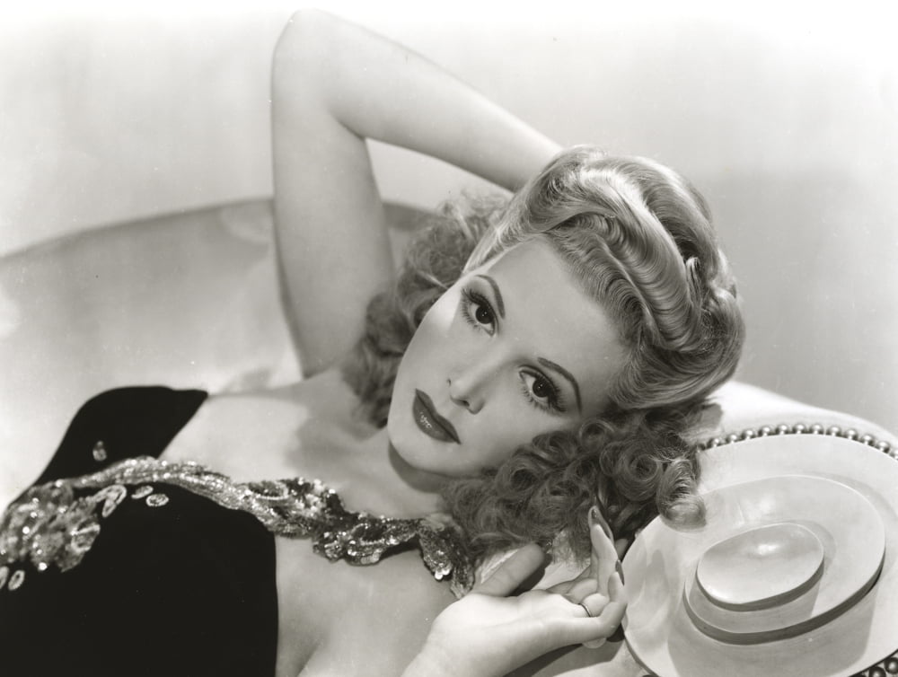 Ann Miller lying down photo print showcasing vintage glamour