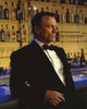 Daniel Craig leaning in a black tuxedo photo print