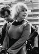 Elke Sommer wearing long sleeve top photo print
