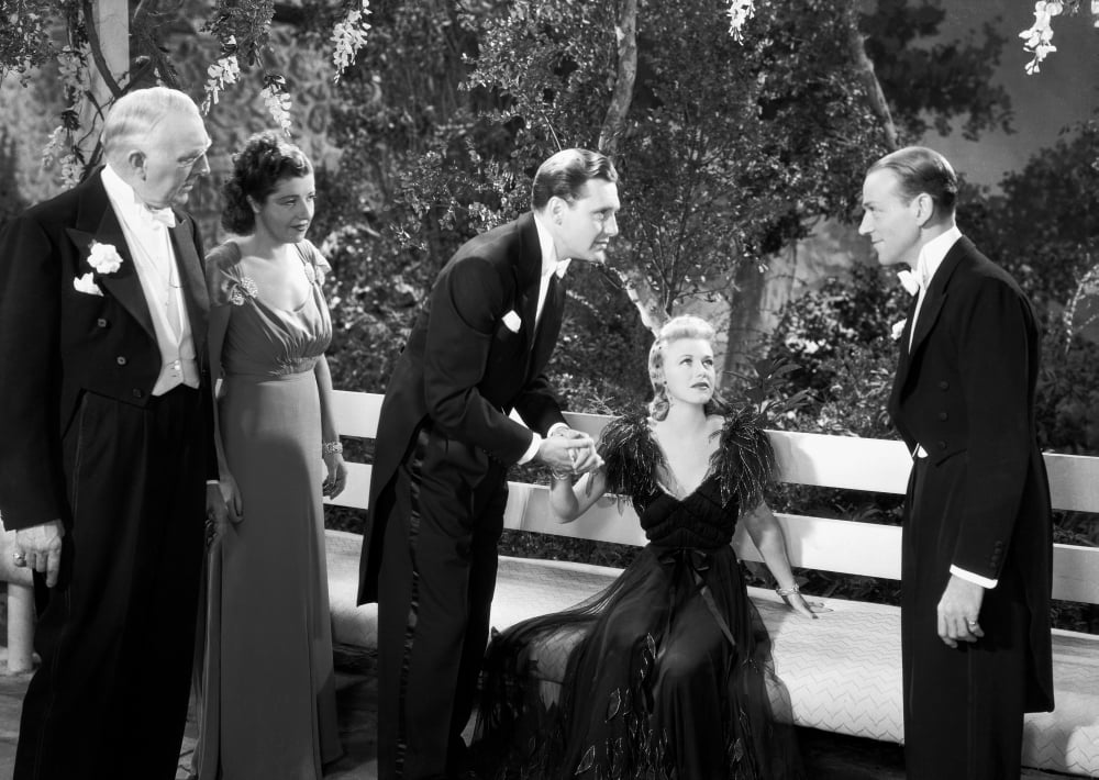 Black and white photo print of Fred Astaire and Ginger Rogers dancing.