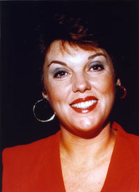 Close-up portrait photo print of Tyne Daly with black background.
