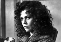 Sigourney Weaver wearing a stylish jacket in a photo print.