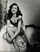 Ann Miller Sitting on Ground Photo Print
