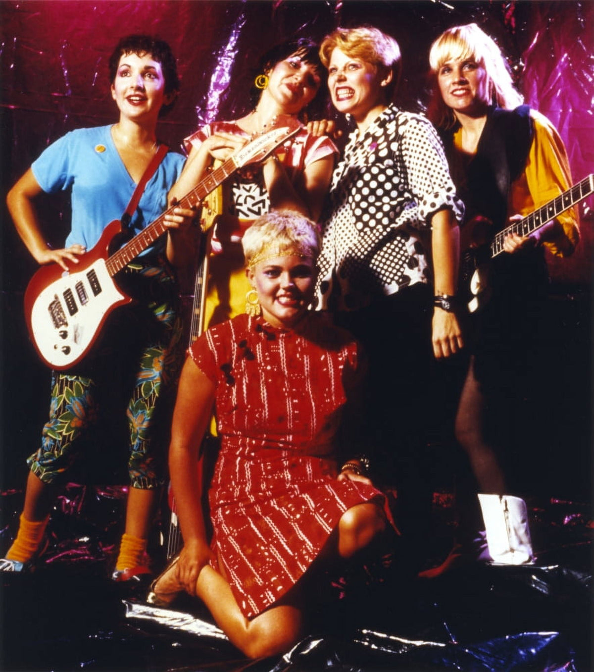 Belinda Carlisle posed with cast art print in vibrant colors.