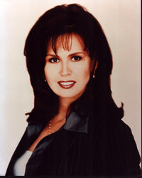 Marie Osmond in pinstripe suit photo print, showcasing elegance and style.