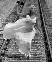 Elke Sommer On Railroad Photo Print featuring elegant vintage style.