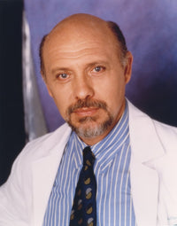 Close-up portrait photo print of Hector Elizondo in formal suit