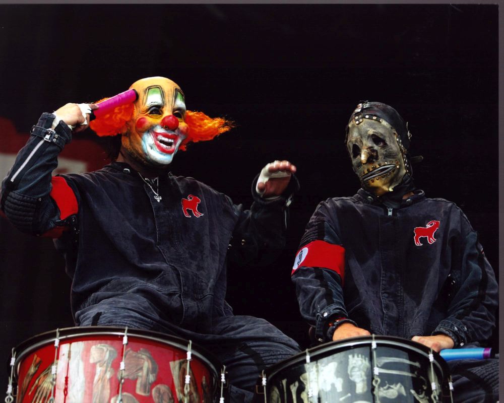 Slipknot on stage photo print featuring Shawn Crahan and Chris Fehn.