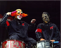 Slipknot on stage photo print featuring Shawn Crahan and Chris Fehn.