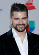 Juanes arriving at the 18th Annual Latin Grammy Awards photo print.