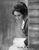 Classic photo print of Elizabeth Taylor looking down, iconic Hollywood portrait.