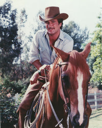 Lee Horsley riding a horse in cowboy outfit photo print