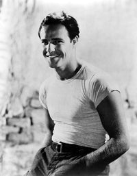 A Streetcar Named Desire movie poster print featuring Marlon Brando, 1951 classic film.
