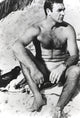 Sean Connery beach photo print capturing iconic moments in cinema.