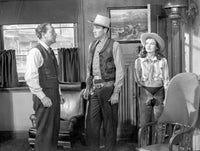 Tall In The Saddle Photo Print showcasing a classic movie scene.