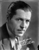 Signed portrait photo print of Warner Baxter, classic cinema artwork.