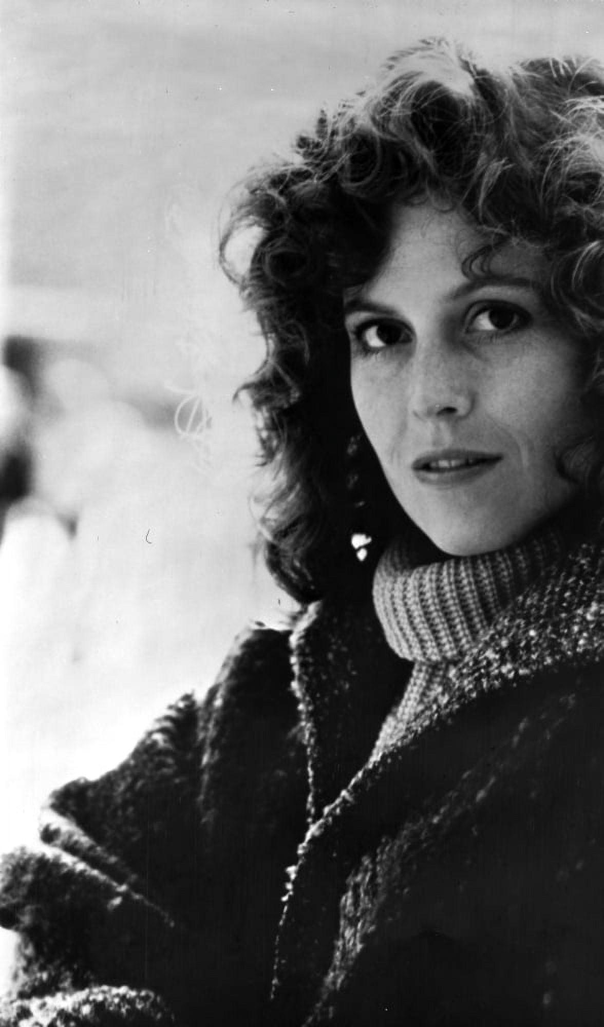 Portrait photo print of Sigourney Weaver wearing a coat and sweater.