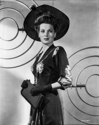 Maureen O'Hara elegant photo print in black dress with hat and gloves.