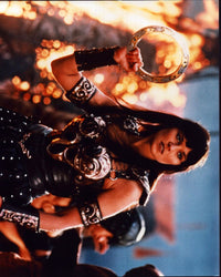 Lucy Lawless as Xena holding chakram photo print