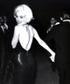 Marilyn Monroe looking over her shoulder in an evening dress photo print.
